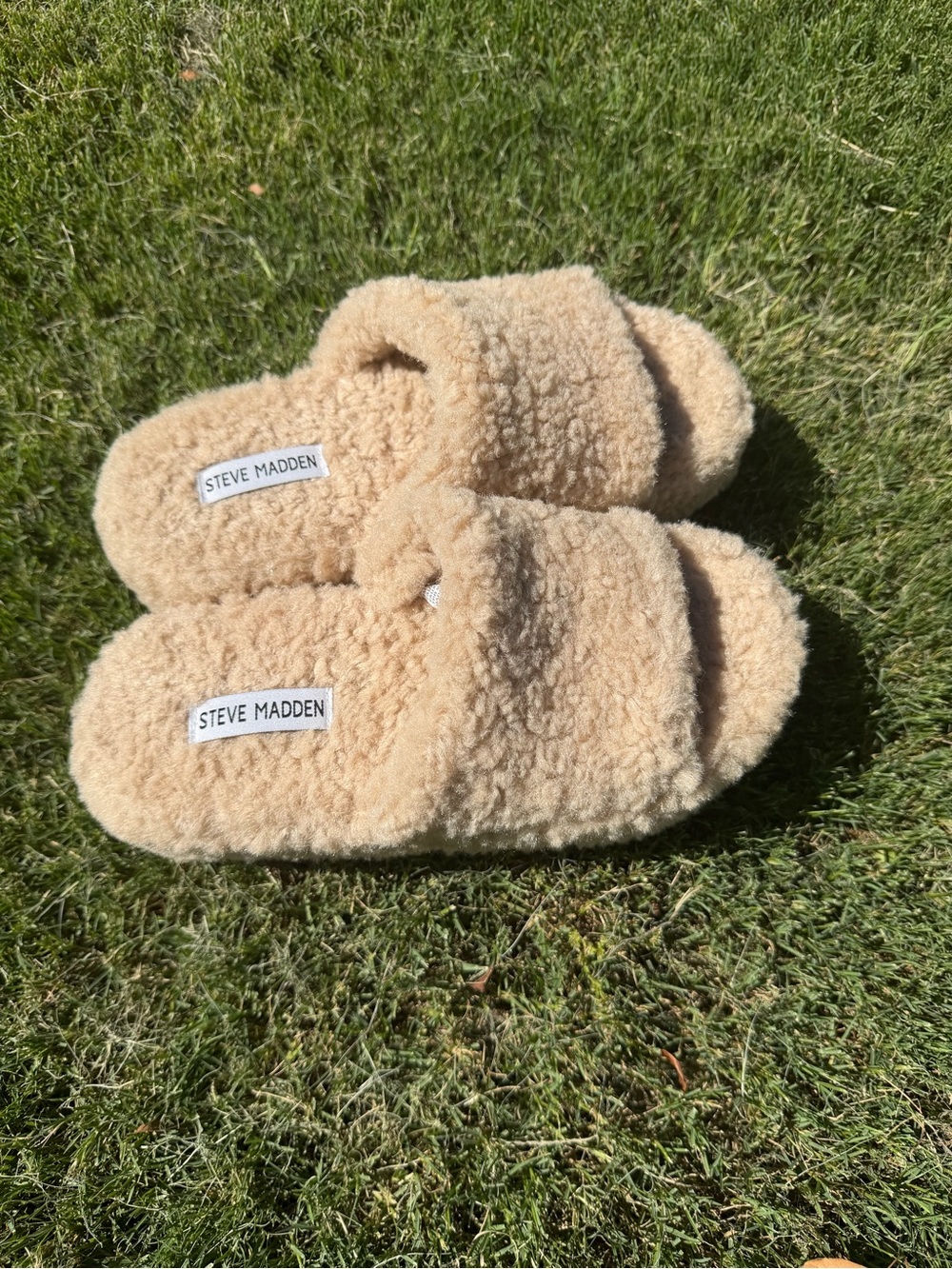 Steve Madden fluffy platform tan slippers.